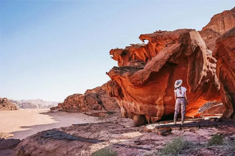 Bedouin camp and traditional tent in Wadi Rum desert with sandstone massifs in background, Jordan full day jeep safari